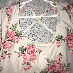 Cross back white dress with pink roses on it